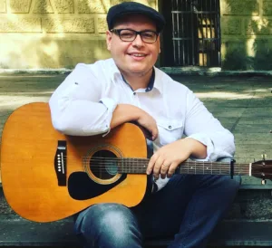 Carlos Dinarte ao violão